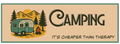 A retro-style illustrated banner with the word 'CAMPING' in large dark lettering, a vintage trailer, mountains, trees, and a campfire on a tan background, with the phrase 'IT'S CHEAPER THAN THERAPY' below.