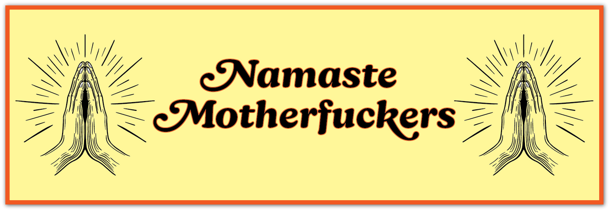 A rectangular graphic with a pale yellow background, bordered by a thin orange line. The central text reads 'Namaste Motherfckers' in dark brown cursive, flanked by two black line-art praying hands illustrations with radiating lines.