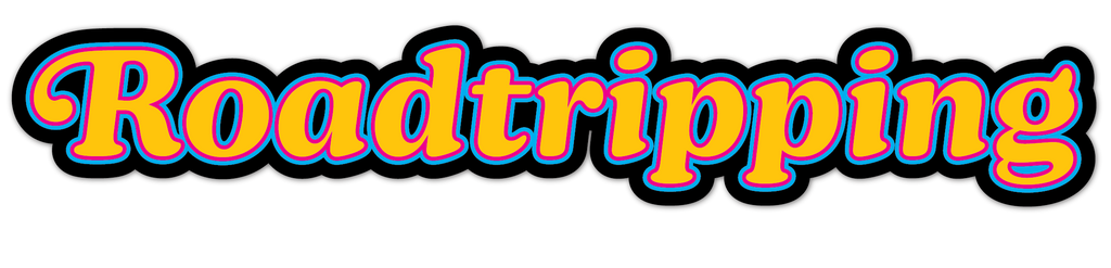 A stylized graphic reading 'Roadtripping' in bold rounded letters with a yellow-to-orange gradient fill, blue outline, and black shadow on a black background.